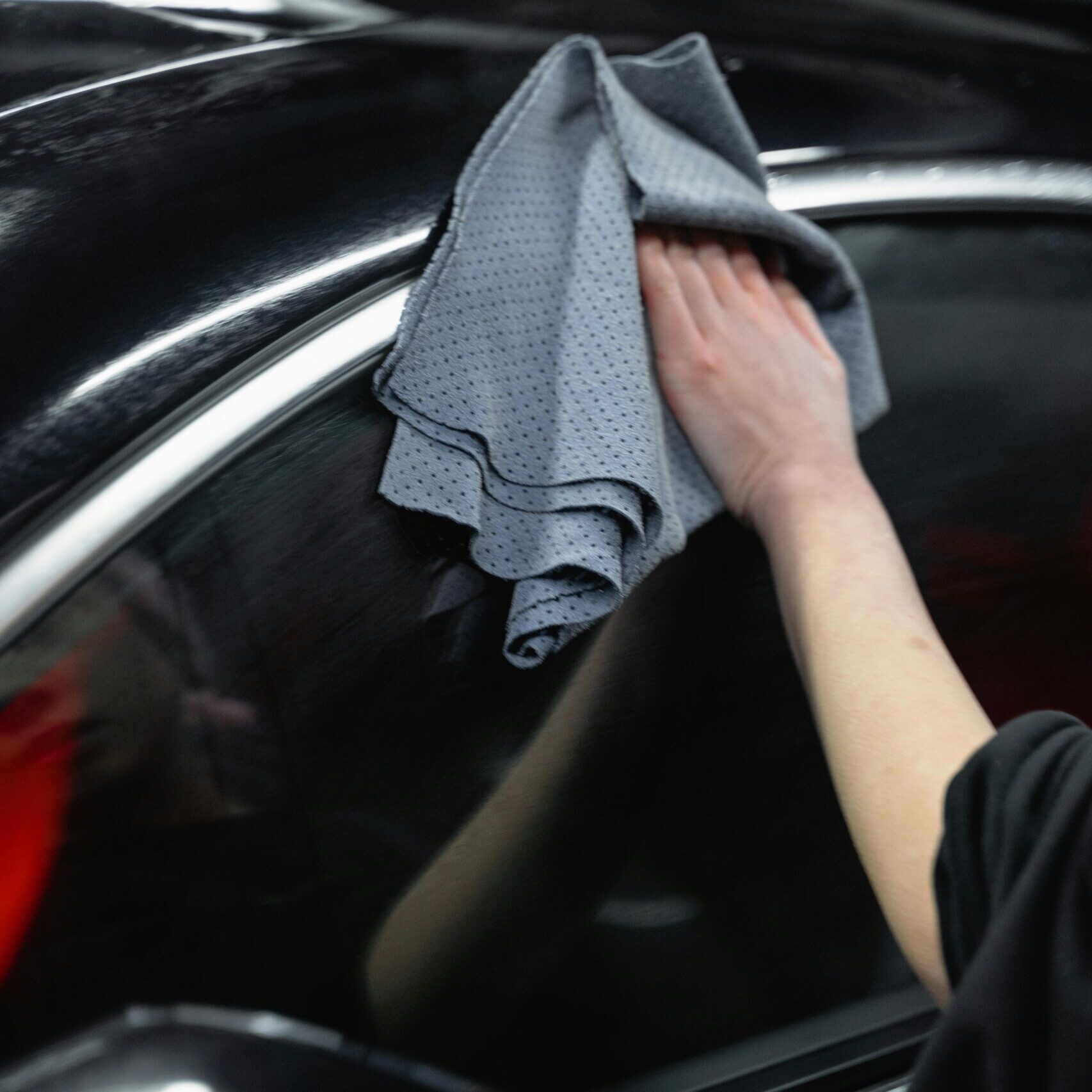 Microfibre cloth on black paint